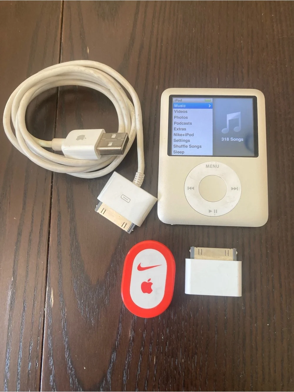 Apple iPod Nano 3rd Generation 4GB Model A1236 Silver with Nike pod/ Working